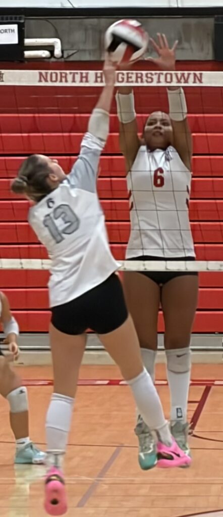 North Hagerstown's Mia Johnson (6) goes up to block a shot by Oakdale's Emily Gaither