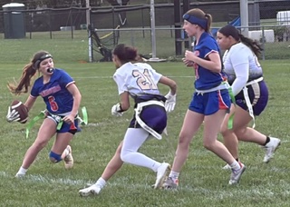 Boonsboro's Katie Ransom (6) tries to make a cut to elude Smithsburg's Melyssa Bard.